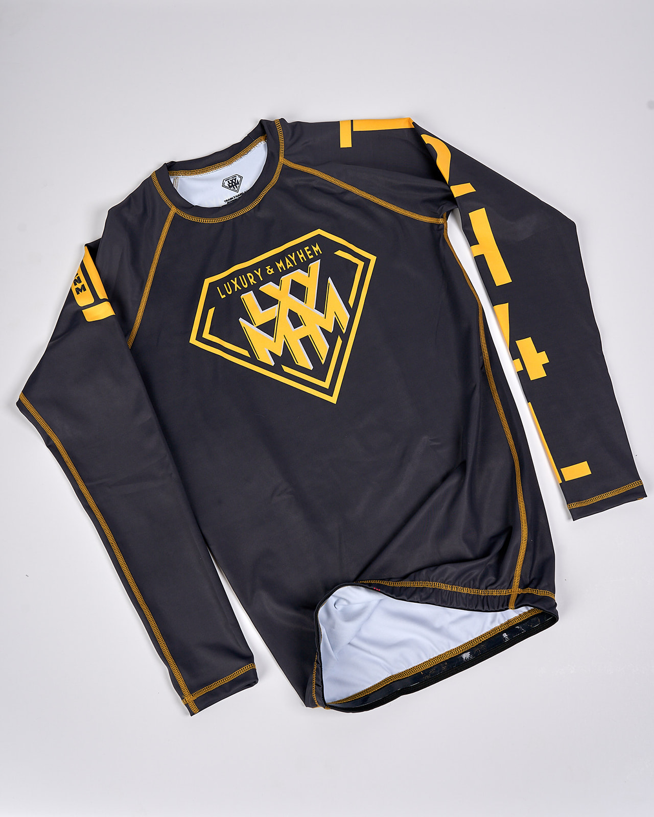 Luxury & Mayhem Diamond Rashguard Black & Gold