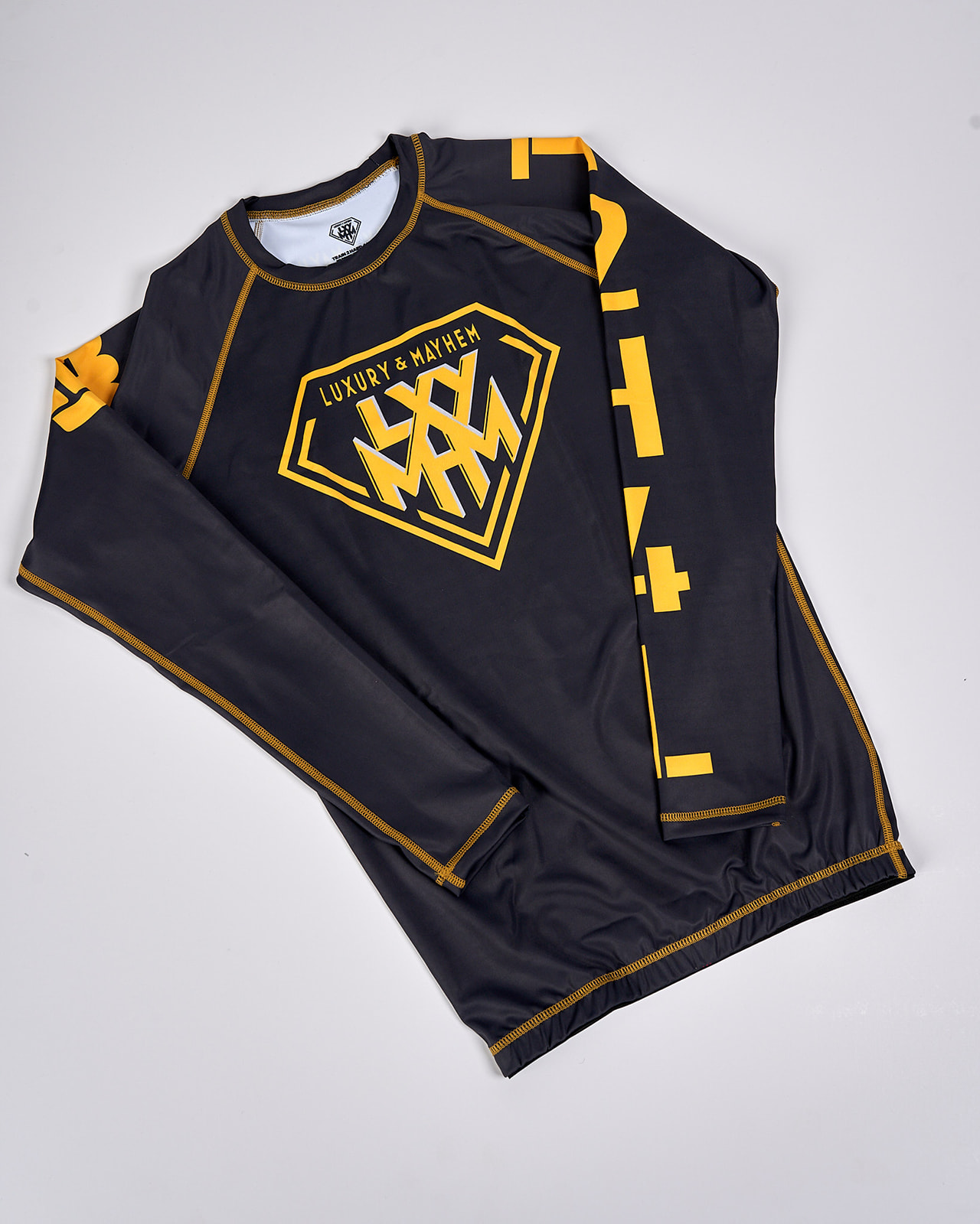 Luxury & Mayhem Diamond Rashguard Black & Gold